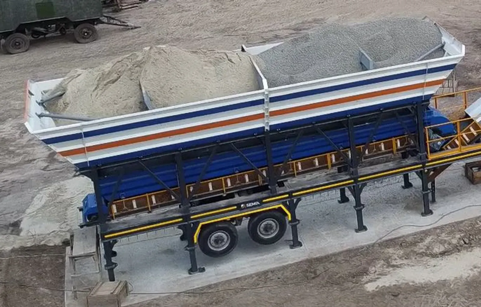 Semix Mobile 120S4 — In SEMIX Mobile 120S4 batch plants, only one ramp is needed to load aggregate storage silos thanks to its' patented design. Inline silo structure eliminates the need for installing a pre-feeding conveyor.